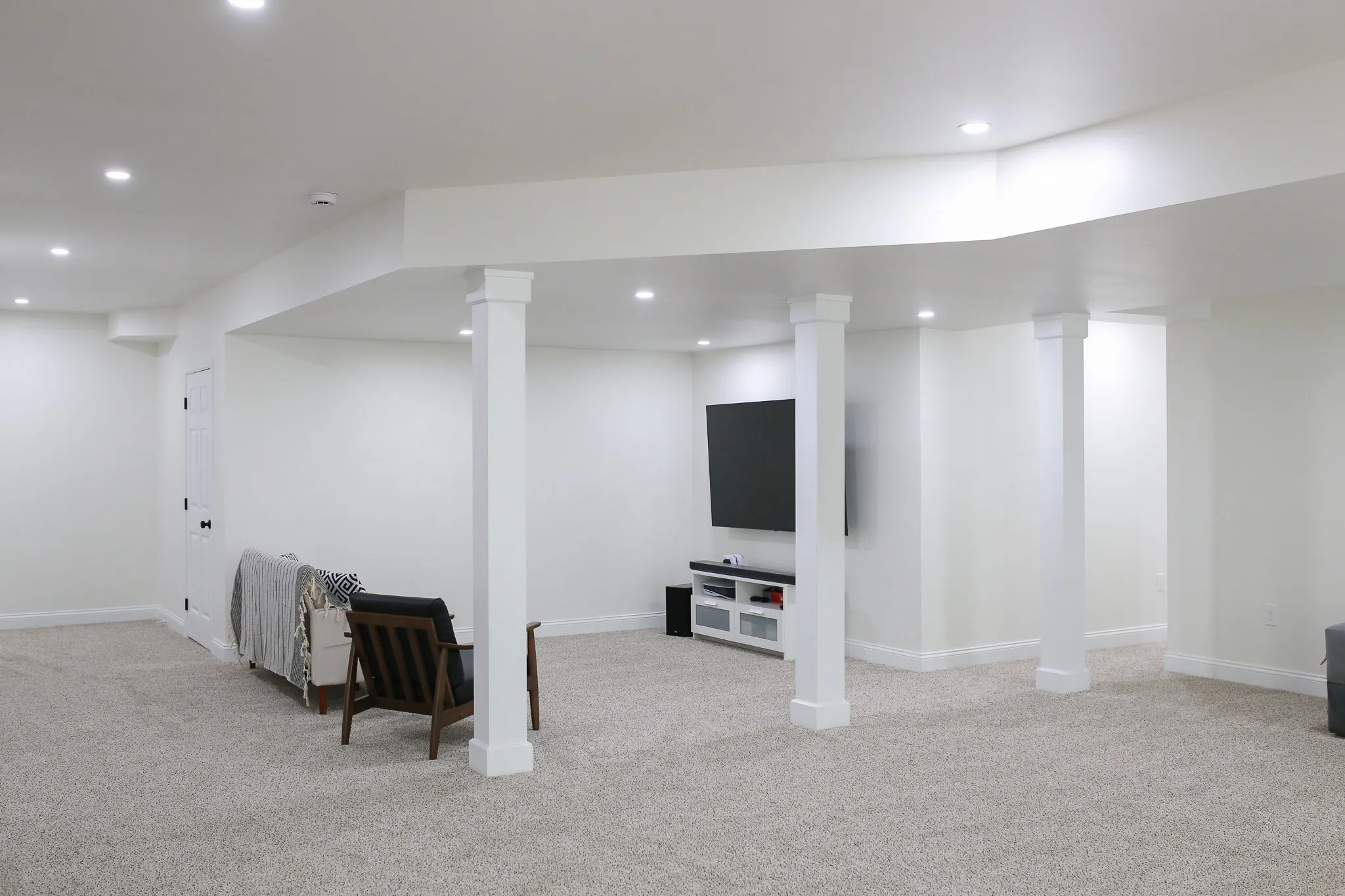 Finished basement showing service area for Miller Home Group